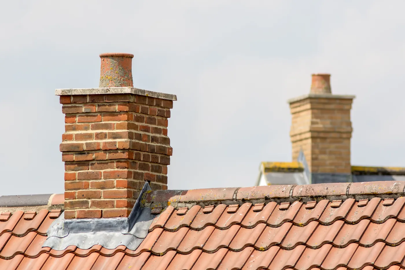 Chimney Repairs work on a roof